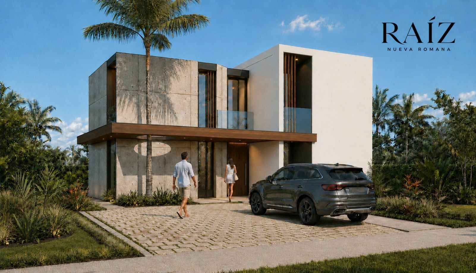 Fachada principal de la villa con acceso de vehículos